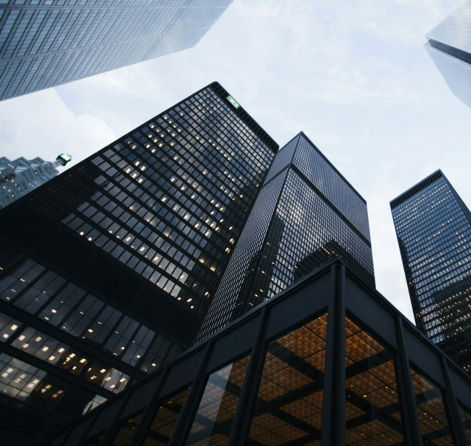 low angle photo of city high rise buildings during daytime